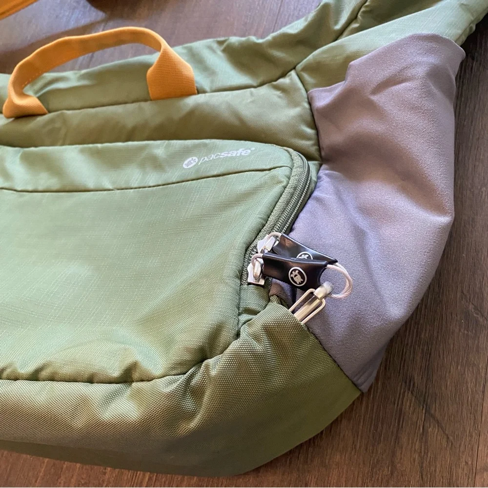 Pacsafe Olive Green and Mustard Yellow Crossbody Camera Bag